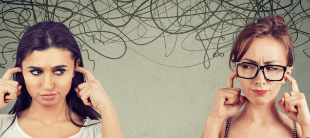 Image of two women who are standing apart, but have their fingers pointing to their mind. Their expressions are of wonder and frustration. Scribbles enhance the image to portray thoughts moving from one to the other of the women.