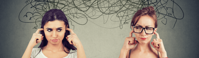 Image of two women who are standing apart, but have their fingers pointing to their mind. Their expressions are of wonder and frustration. Scribbles enhance the image to portray thoughts moving from one to the other of the women.